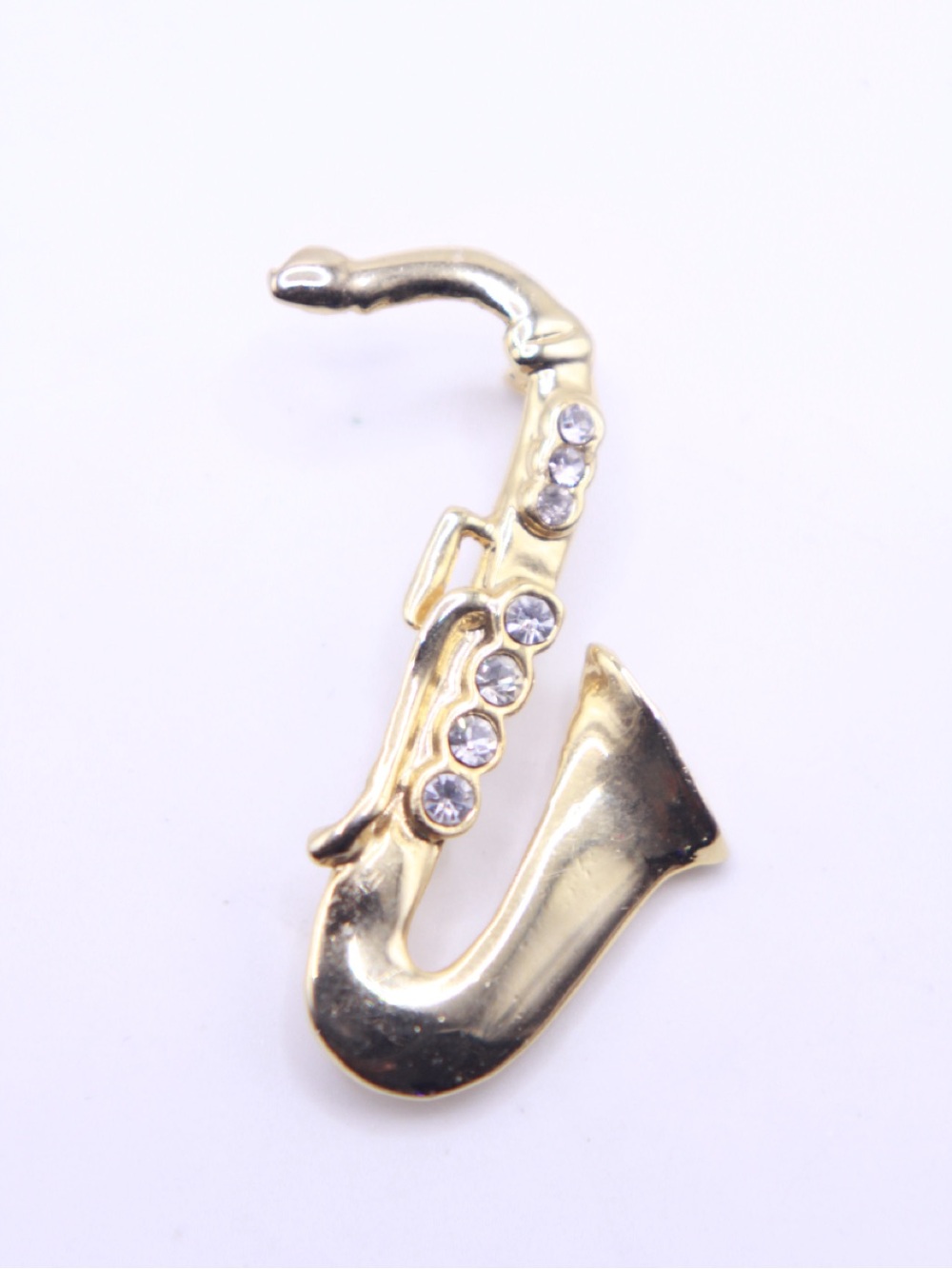 Gold tone Saxophone Pin Brooch with Crystal Accents